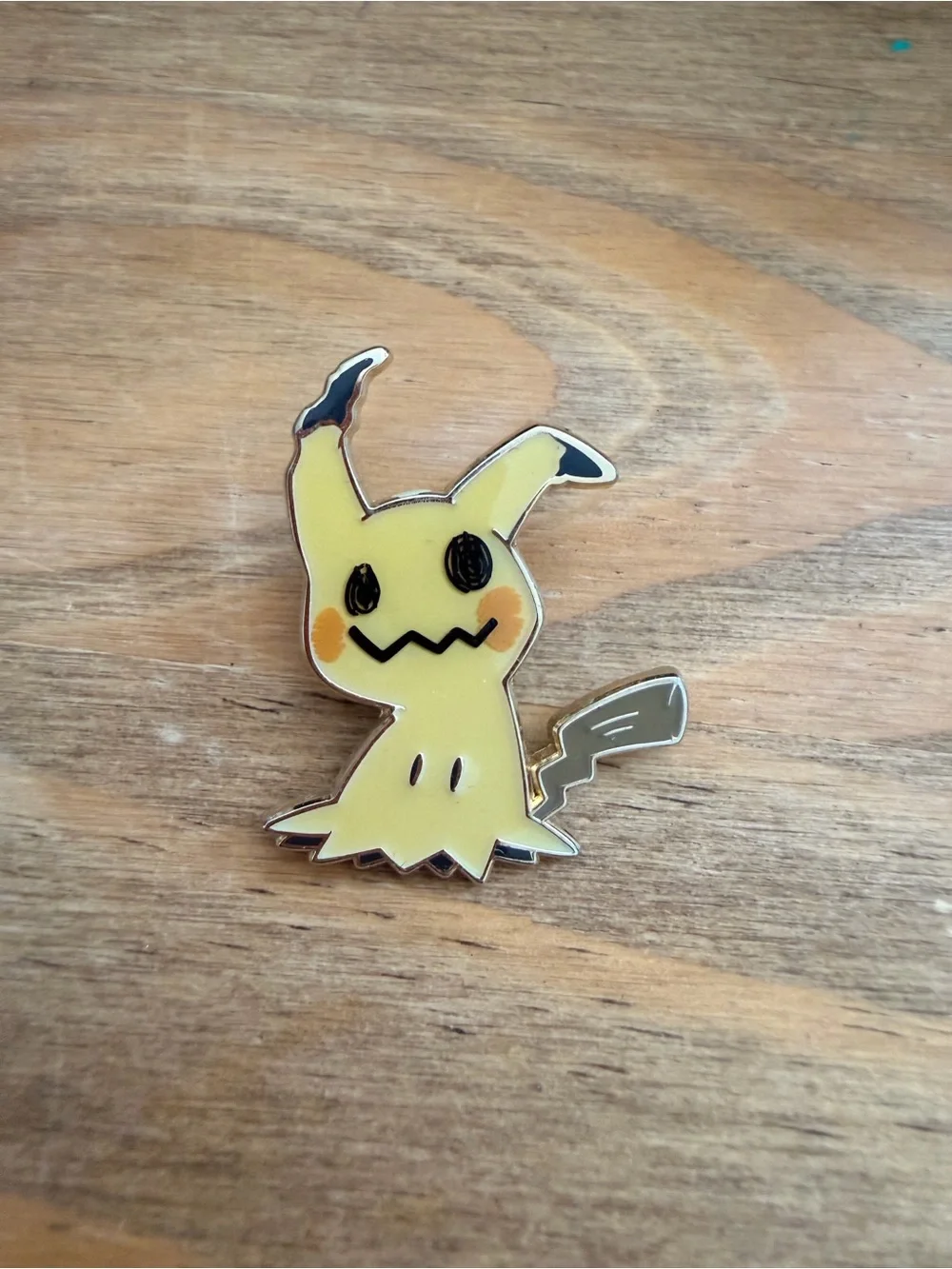 Pokemon Mimikyu Yellow Enamel Pin with Black & Orange Accents